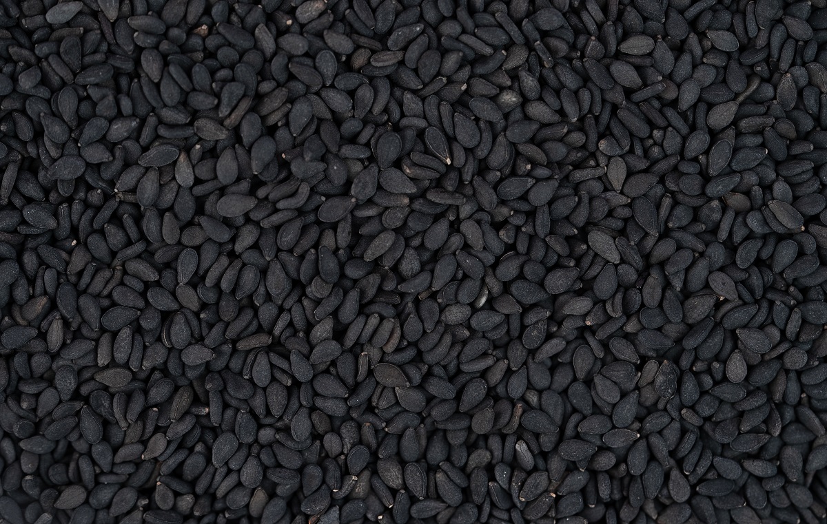 Black sesame seeds texture. Directly above